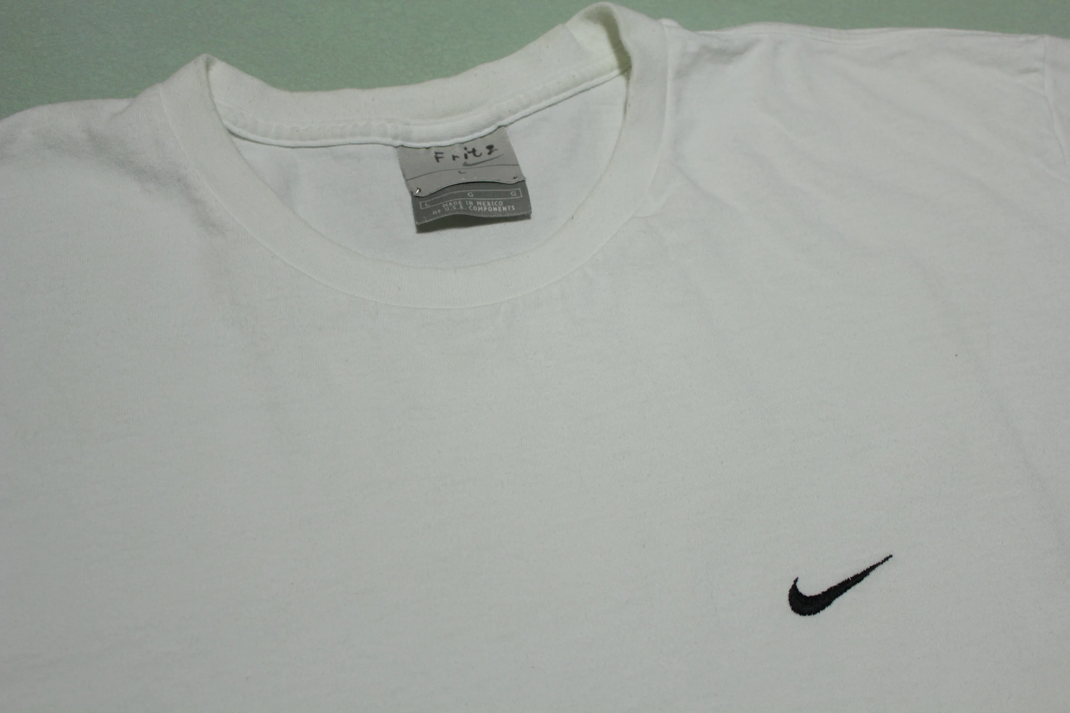 Nike Basic Essential Off Center Embroidered Mini Swoosh Check Stitched T-Shirt